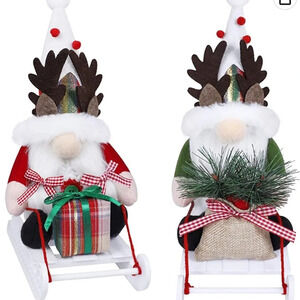 NIB! Two Christmas gnome figures on sleds